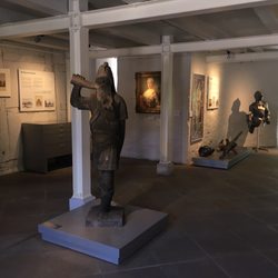 Stadtmuseum Schloss Wolfsburg - Ground floor of the museum. Descriptions are in German and English.