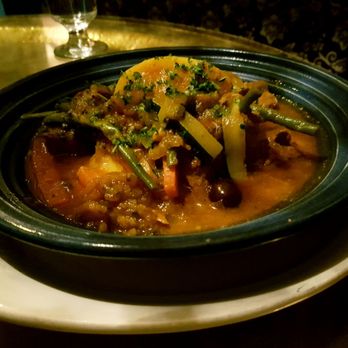 Sultan's Tent - a bowl of stew on a plate - Moroccan Near Me - Calgary, Alberta