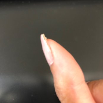 Herbal Head & Nail Spa - Already peeling from the side, I'm afraid to rip it because my entire polish will easily remove. 3rd day for "gel" - Nail Salons Near Me - Garden Grove, California