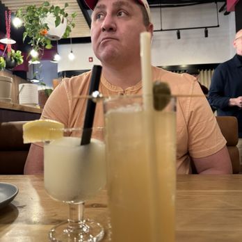 Dizengoff - Boozy lemonade slush and Gin cocktail complete with disco toothpicked olive - Middle Eastern Near Me - Philadelphia, Pennsylvania