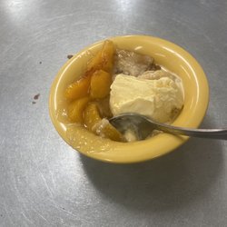 Texas Street 301 - Peach cobbler with ice cream