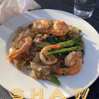 Beau Thai - Shrimp Pad Se Ew and in the background Drunken Noodles - Thai Near Me - Washington, DC, District of Columbia