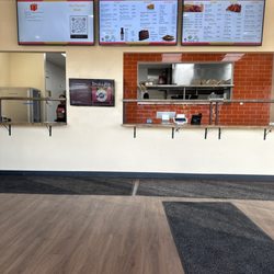 Uncle Remus - Menu and windows to order or pick up. This not a good place to eat in. It's better to take to go.