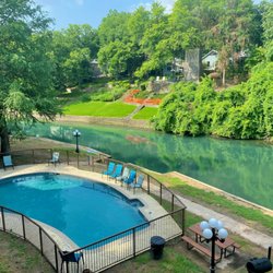River City Resorts - Inverness pool with beautiful view of the Comal River.