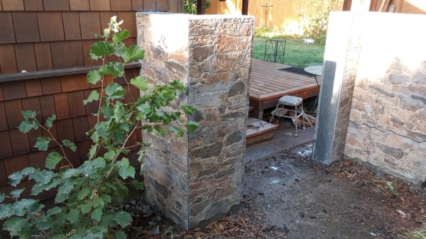 Exterior wall epoxy and tile - Constructed exterior wall and framed with sheet rock then framed top and poured concrete. Epoxy coated top and entrance then used two different types of tile for each side Exterior wall epoxy and tile - Constructed exterior wall and framed with sheet rock then framed top and poured concrete. Epoxy coated top and entrance then used two different types of tile for each side