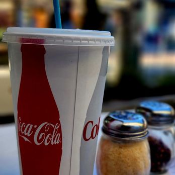 Napolini Pizzeria - a coca cola cup with a straw - Pizza Near Me - Anaheim, California Napolini Pizzeria - a coca cola cup with a straw - Pizza Near Me - Anaheim, California