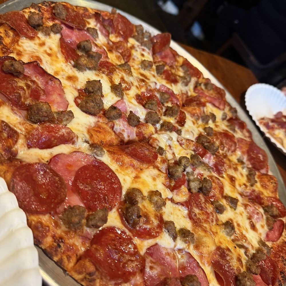 Thin crust meat lovers, a carnivores delight Thin crust meat lovers, a carnivores delight