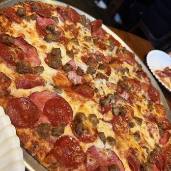 Rusty's Pizza Parlor - Thin crust meat lovers, a carnivores delight - Pizza Near Me - Santa Barbara, California Rusty's Pizza Parlor - Thin crust meat lovers, a carnivores delight - Pizza Near Me - Santa Barbara, California