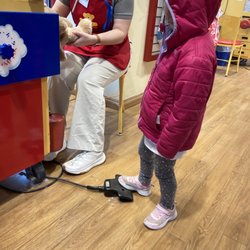 Build-A-Bear Workshop - Kiddos get to push the peddle that releases the stuffing into their animal