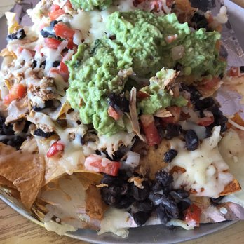 Taco Tonto's - Nachos with beans, pico de gallo, guacamole and chicken! - Mexican Near Me - Kent, Ohio Taco Tonto's - Nachos with beans, pico de gallo, guacamole and chicken! - Mexican Near Me - Kent, Ohio