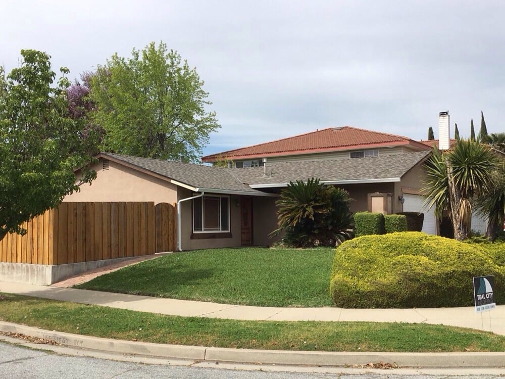 Slide of Teal City Roofing