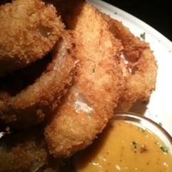 Bahama Breeze - Citrus sauce next to humongo onion rings
