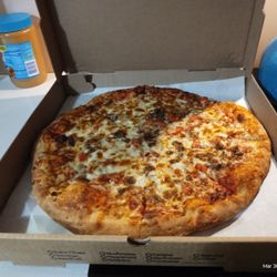 Milford House of Pizza - Hamburger, tomato and onion large pizza.