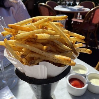 Bouchon - Pommes Frites - French fries with truffles - ketchup & garlic aïoli for dipping - French Near Me - Yountville, California Bouchon - Pommes Frites - French fries with truffles - ketchup & garlic aïoli for dipping - French Near Me - Yountville, California