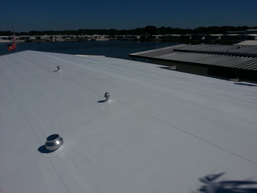 Slide of Absolute Roofing of Florida