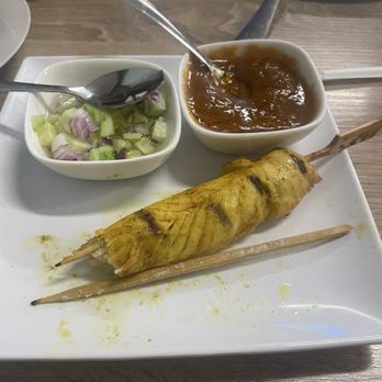 Blue Table Thai Cuisine - Chicken Sate- very good, cucumber sauce was my favorite-slightly sweet - Thai Near Me - Bakersfield, California Blue Table Thai Cuisine - Chicken Sate- very good, cucumber sauce was my favorite-slightly sweet - Thai Near Me - Bakersfield, California