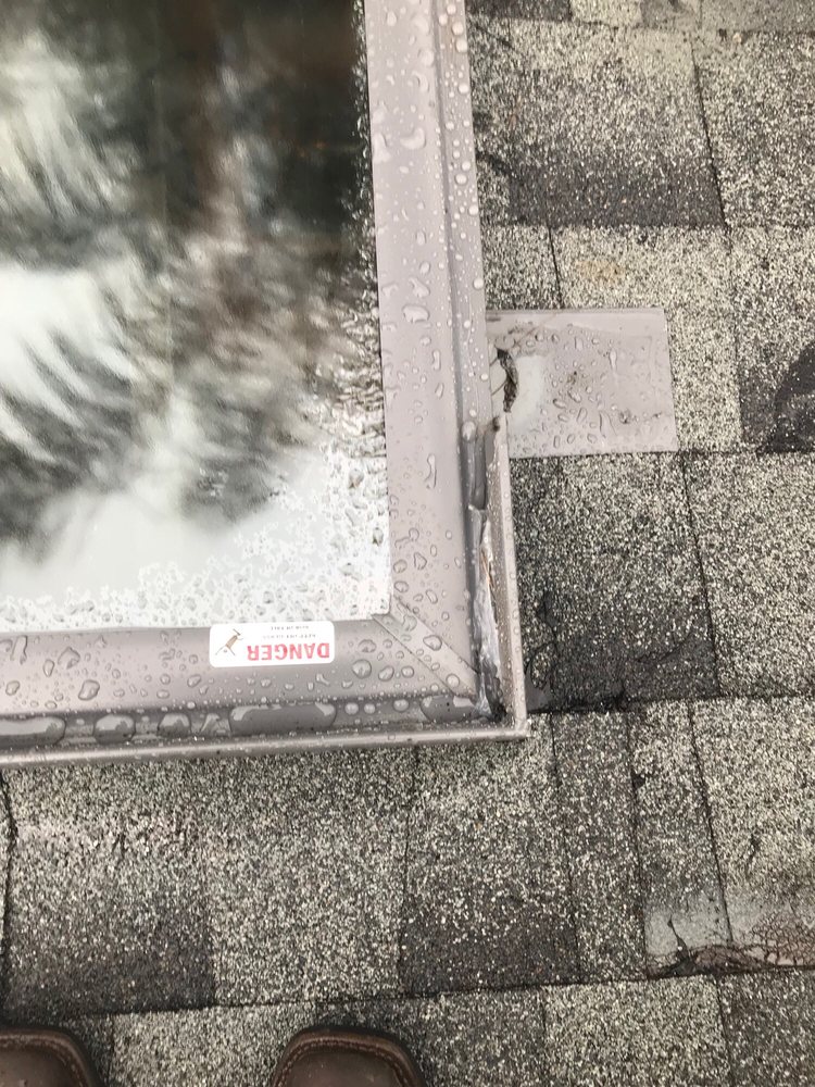 Slide of Mackel Roofing Company