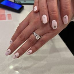 Emmalee did my simple Valentine's Day themed gel manicure in February