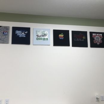 JC Screenprinting - Shirts on the wall, including the new Eye39 shirt! - Graphic Design Near Me - Goodfield, Illinois