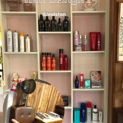 A Cut Above Hair Design - Professional products for sale.