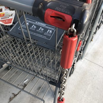 ALDI - a shopping cart with a chain attached to it - Grocery Near Me - Lake City, Florida ALDI - a shopping cart with a chain attached to it - Grocery Near Me - Lake City, Florida