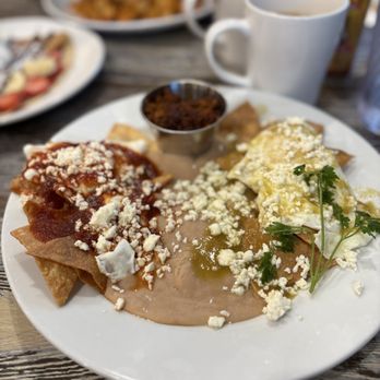 Lala's Waffles Crepes Shakes - Huevos Divorciado! Red and green sauce over tortilla chips. eggs, Beans and chorizo in small cup. This was all very tasty! - Breakfast & Brunch Near Me - Indio, California Lala's Waffles Crepes Shakes - Huevos Divorciado! Red and green sauce over tortilla chips. eggs, Beans and chorizo in small cup. This was all very tasty! - Breakfast & Brunch Near Me - Indio, California