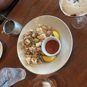 Carmine's Restaurant and Bar - Calamari with marinara - Spanish Near Me - Tampa, Florida Carmine's Restaurant and Bar - Calamari with marinara - Spanish Near Me - Tampa, Florida