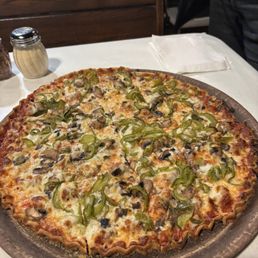 Thin sausage and vegetable pizza