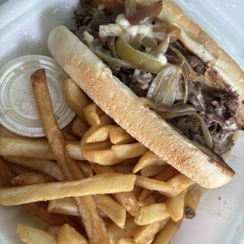 Mikhael's Cafe & Catering - Mikhael's Cheesesteak with fries - New American Near Me - Greensboro, North Carolina Mikhael's Cafe & Catering - Mikhael's Cheesesteak with fries - New American Near Me - Greensboro, North Carolina