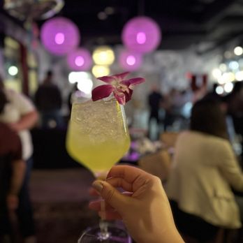 Petite Boheme - Verdant Spritz with edible flower - Cocktail Bars Near Me - Las Vegas, Nevada