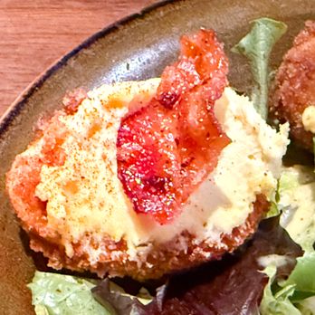 Lazy Dog - Close up of a Crispy Fried Egg, with bacon candy topping - New American Near Me - Fresno, California