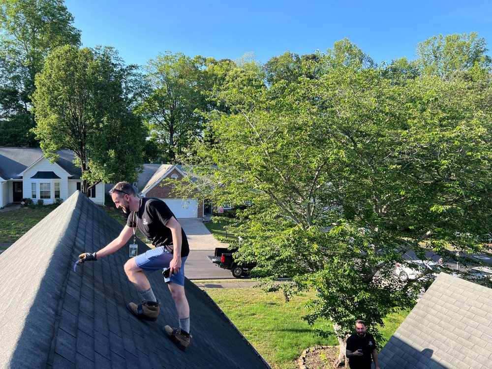 Slide of The Roofing Company