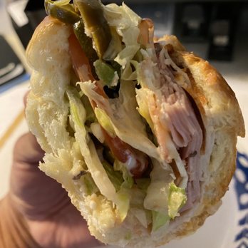 Subway - a person holding a sandwich in their hand - Sandwiches Near Me - New Haven, Michigan