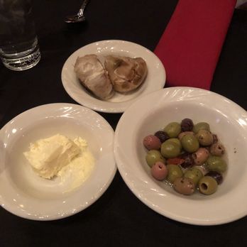 Ti Amo Italian Grille - assorted olives, roasted garlic & butter - Italian Near Me - Carson City, Nevada Ti Amo Italian Grille - assorted olives, roasted garlic & butter - Italian Near Me - Carson City, Nevada