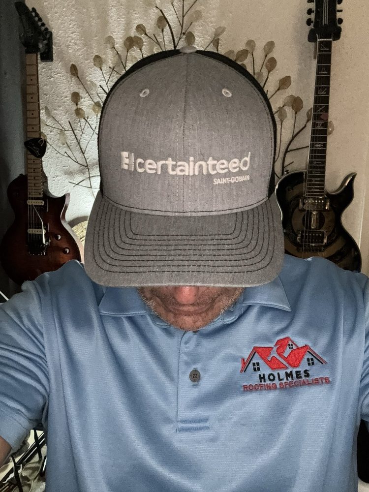 Slide of Holmes Roofing Specialists