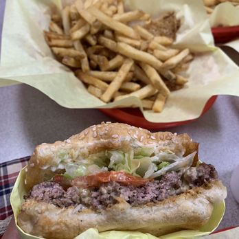 Sky Rocket Burger - single burger with no cheese (bottom)  handcut fries (top) - Burgers Near Me - Dallas, Texas