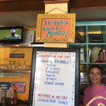 Toasted Mango Cafe - This was the sign when you first walk in. - Cafes Near Me - Sarasota, Florida