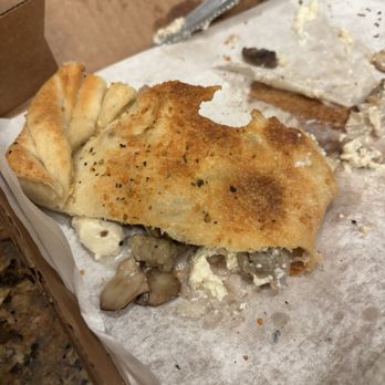 Pieology Pizzeria Plantation - Calzone with ricotta, sausage, and mushrooms - Pizza Near Me - Plantation, Florida Pieology Pizzeria Plantation - Calzone with ricotta, sausage, and mushrooms - Pizza Near Me - Plantation, Florida