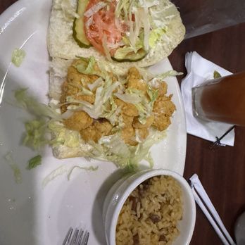 Tibby's New Orleans Kitchen - Shrimp po-HALF & HALF PO BOY and Dirty rice - Cajun/Creole Near Me - Winter Park, Florida Tibby's New Orleans Kitchen - Shrimp po-HALF & HALF PO BOY and Dirty rice - Cajun/Creole Near Me - Winter Park, Florida