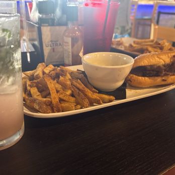 Hurricane Eddie's - Half my French dip and an amazing watermelon mojito! - Sports Bars Near Me - Clearwater Beach, Florida