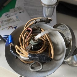 S & V General Supply - All the old wiring is still in the lamp - so much for "rewiring" job!