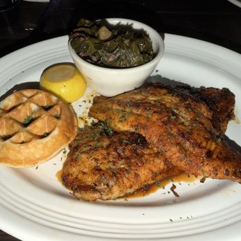 Taste Kitchen + Bar - Castfish platter with collards & biscuit waffle - Comfort Food Near Me - Sugar Land, Texas Taste Kitchen + Bar - Castfish platter with collards & biscuit waffle - Comfort Food Near Me - Sugar Land, Texas