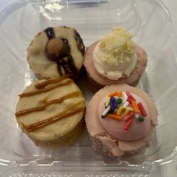 Buckeye, wedding cake, strawberry, and cookie butter cheesecake minis