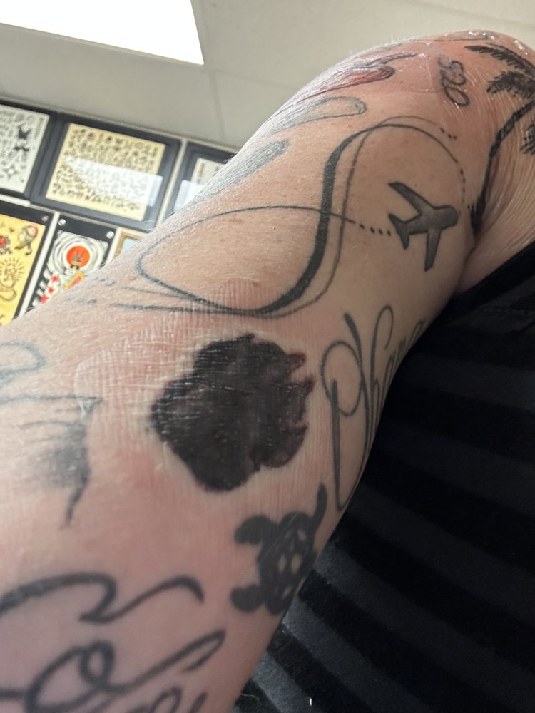 Sincerely Tattoo Logo