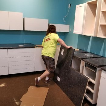 Powell Construction - Installing cabinets and countertops - Countertop Installation Near Me