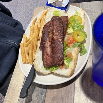 Daisy Mae’s - Alligator po boy - Breakfast & Brunch Near Me - New Orleans, Louisiana Daisy Mae’s - Alligator po boy - Breakfast & Brunch Near Me - New Orleans, Louisiana