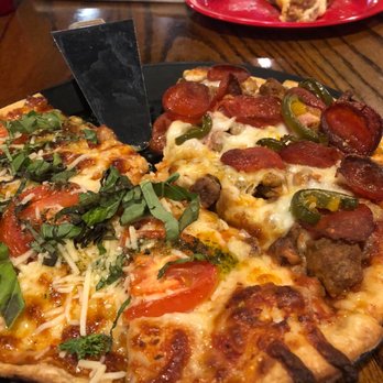 Brick Oven Pizza Company - 1/2 margarita pizza 1/2 bubba - Pizza Near Me - Abilene, Texas