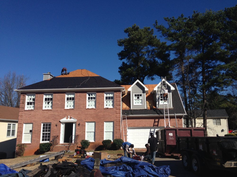 Slide of Dave Clark Roofing