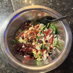 Salad with raspberry vinaigrette dressing. Walnuts, cranberries, feta cheese, and lettuce.Yummy! Bring him in Salad with raspberry vinaigrette dressing. Walnuts, cranberries, feta cheese, and lettuce.Yummy! Bring him in