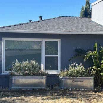 Roofing Solutions - This was just before they finished the flashing around the chimney. - Roofing Near Me - Hayward, California